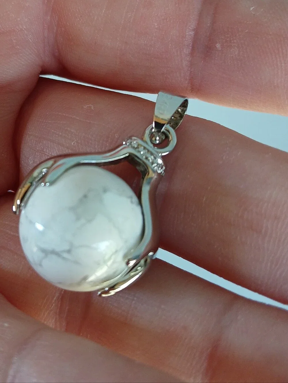 New 18K Hands Holding Howlite Sphere Pendant.